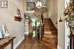 Front Foyer With Grand Staircase -