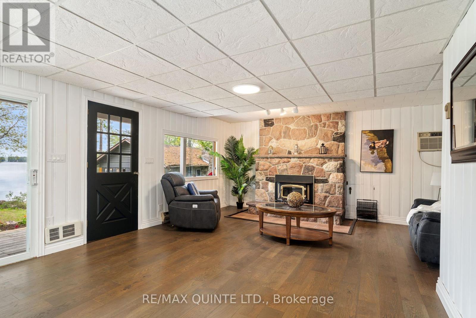 2 Fire Route 2 Route, Trent Lakes, ON - Indoor Photo Showing Living Room With Fireplace