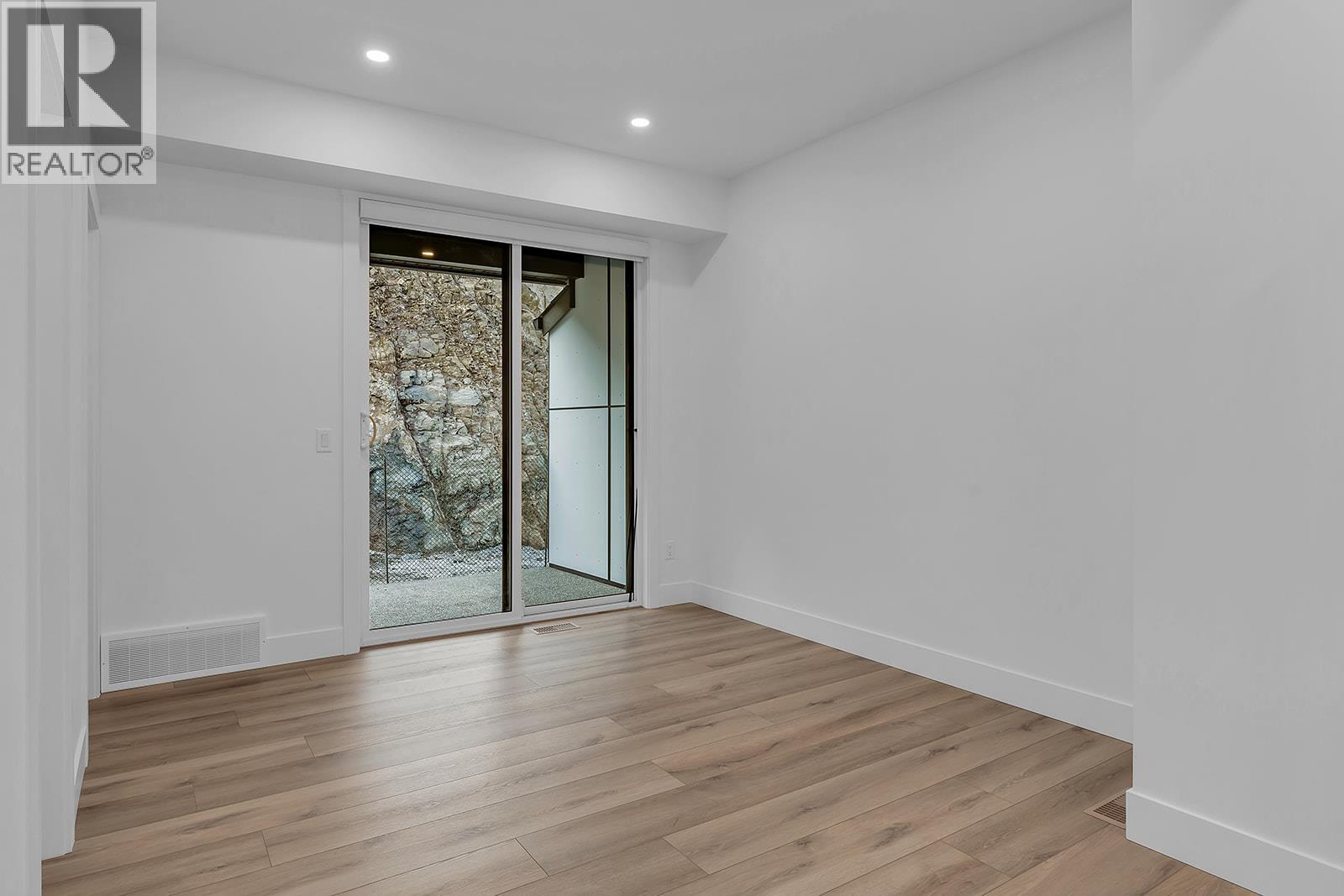 Photo is of a similar home in the community. - 2835 Canyon Crest Drive Unit# 12, West Kelowna, BC - Indoor Photo Showing Other Room