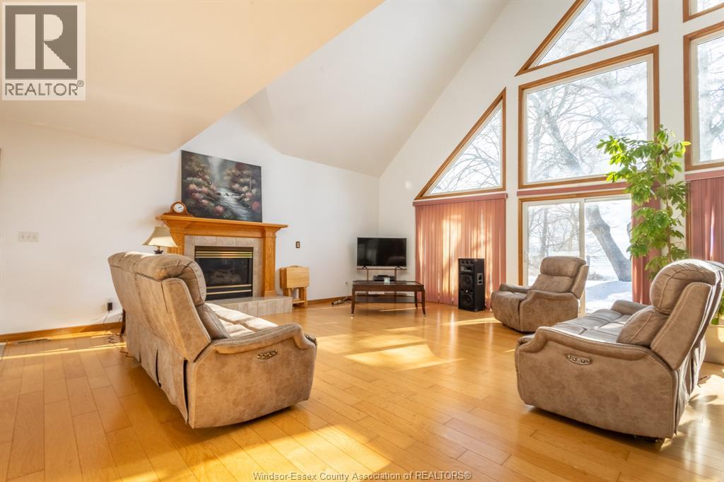 3280 Talbot Trail, Wheatley, ON - Indoor Photo Showing Living Room With Fireplace