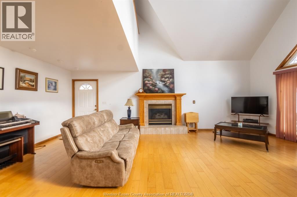 3280 Talbot Trail, Wheatley, ON - Indoor Photo Showing Living Room With Fireplace