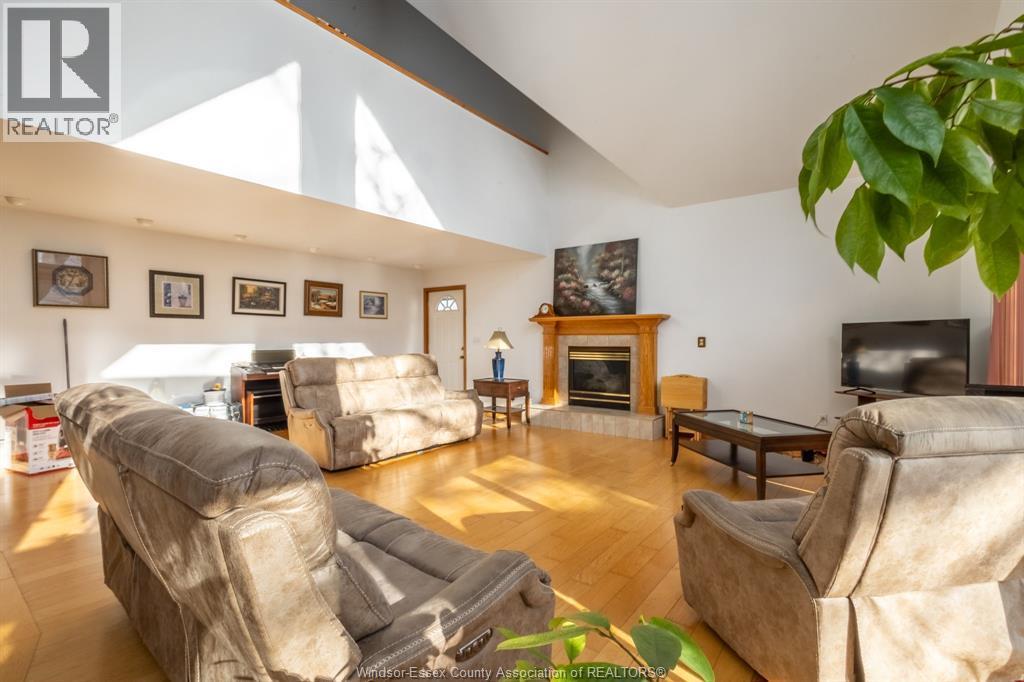 3280 Talbot Trail, Wheatley, ON - Indoor Photo Showing Living Room With Fireplace