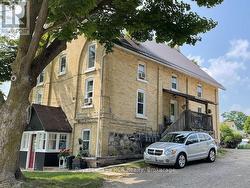 Southeast corner & driveway -