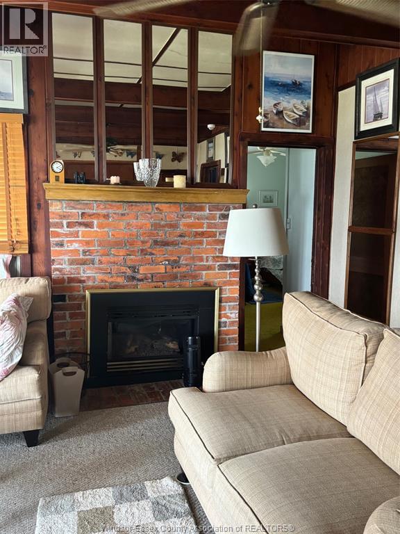680 Point Pelee Drive, Leamington, ON - Indoor Photo Showing Living Room With Fireplace