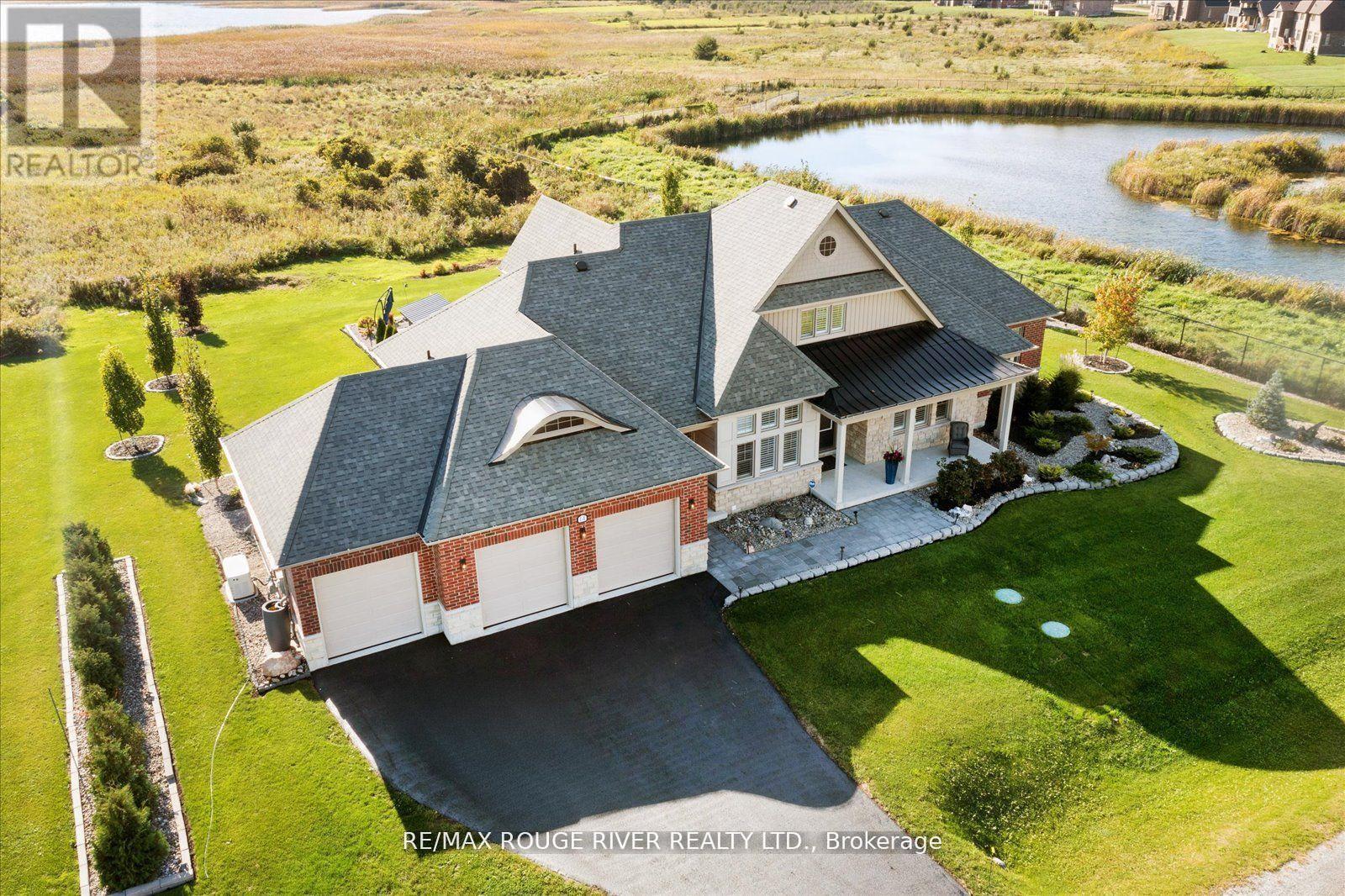 Beautiful Bungaloft overlooking Wellers Bay! - 14 Wellers Way, Quinte West, ON - Outdoor With Body Of Water