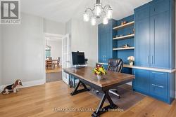 Office with built in shelving -