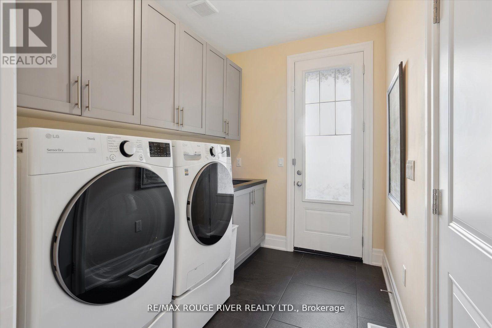 Main floor laundry with separate entrance - 14 Wellers Way, Quinte West, ON - Indoor Photo Showing Laundry Room