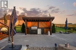 Backyard Patio with built in BBQ and fridge -