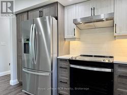 All new stainless steel appliances & built-ins. -