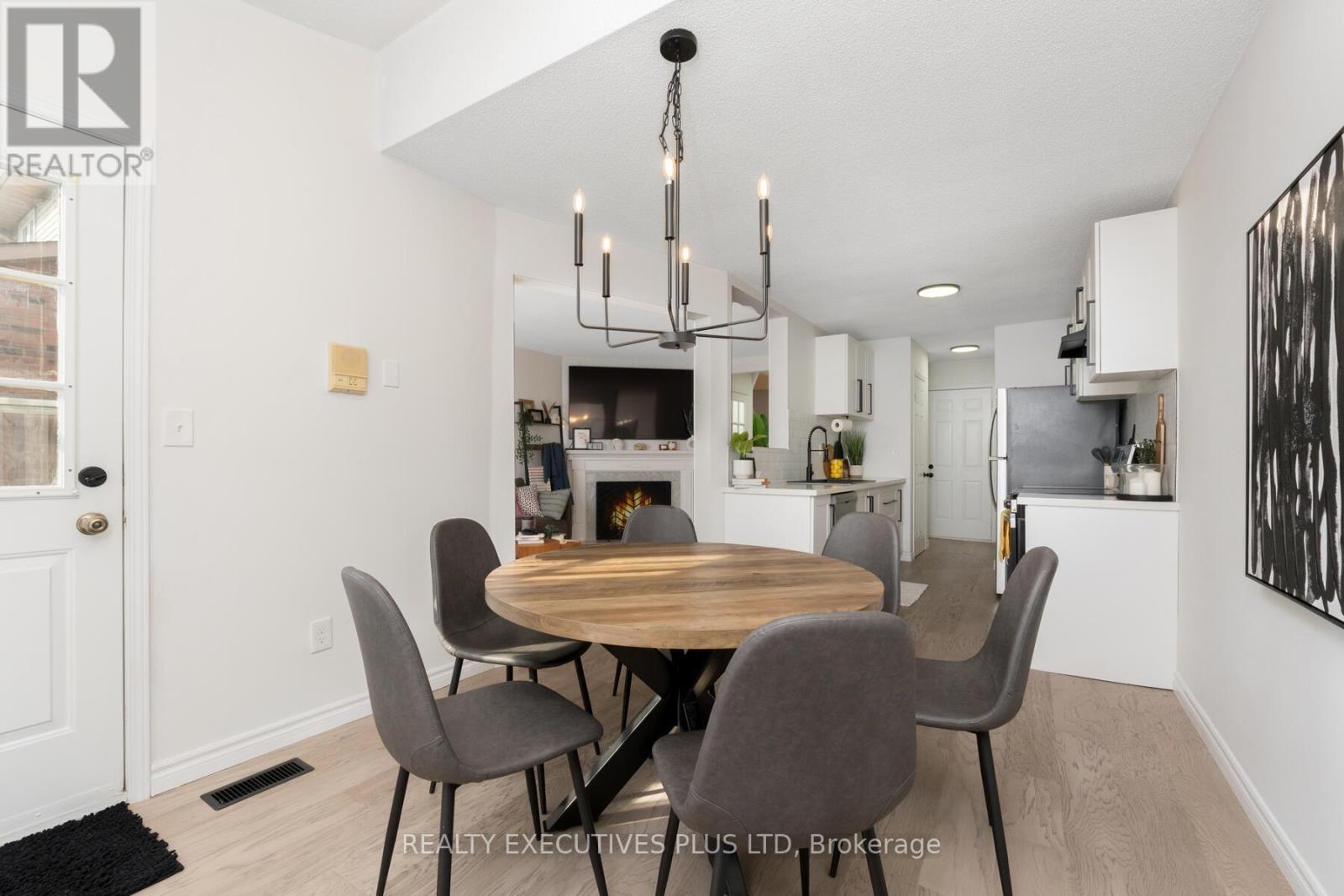 29 Perthshire Court, Hamilton, ON - Indoor Photo Showing Dining Room With Fireplace