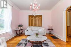 Living Room with Solid wood French doors to Dining -