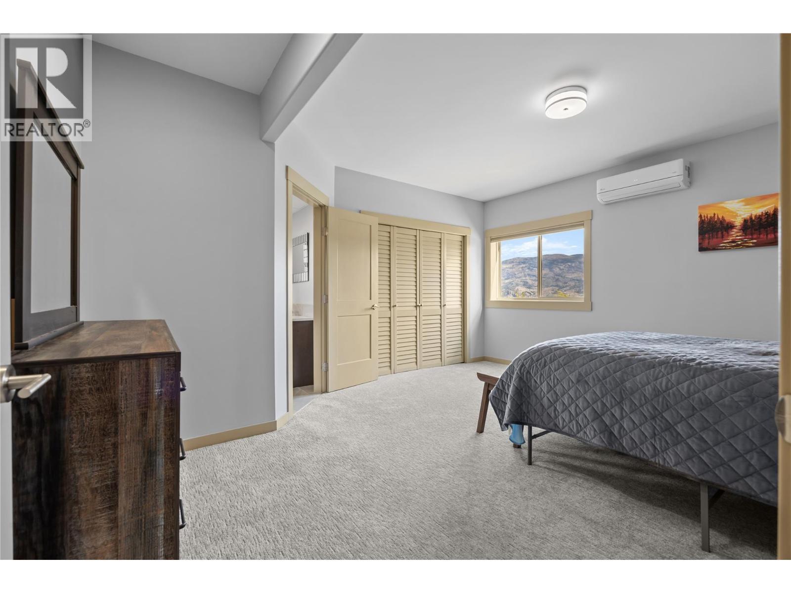 Lower level bedroom - 432 Hwy 97 Highway, Summerland, BC - Indoor Photo Showing Bedroom