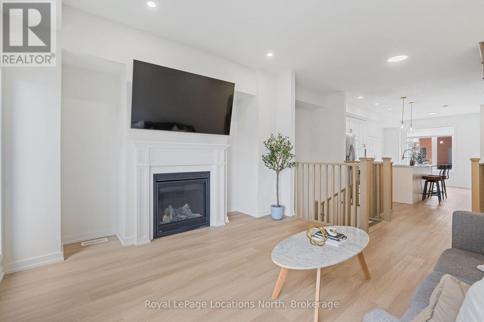 81 Winters Crescent, Collingwood, ON - Indoor Photo Showing Living Room With Fireplace