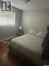 305 Kepula Lane, Calder Rm No. 241, SK - Indoor Photo Showing Bedroom