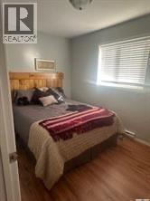 305 Kepula Lane, Calder Rm No. 241, SK - Indoor Photo Showing Bedroom