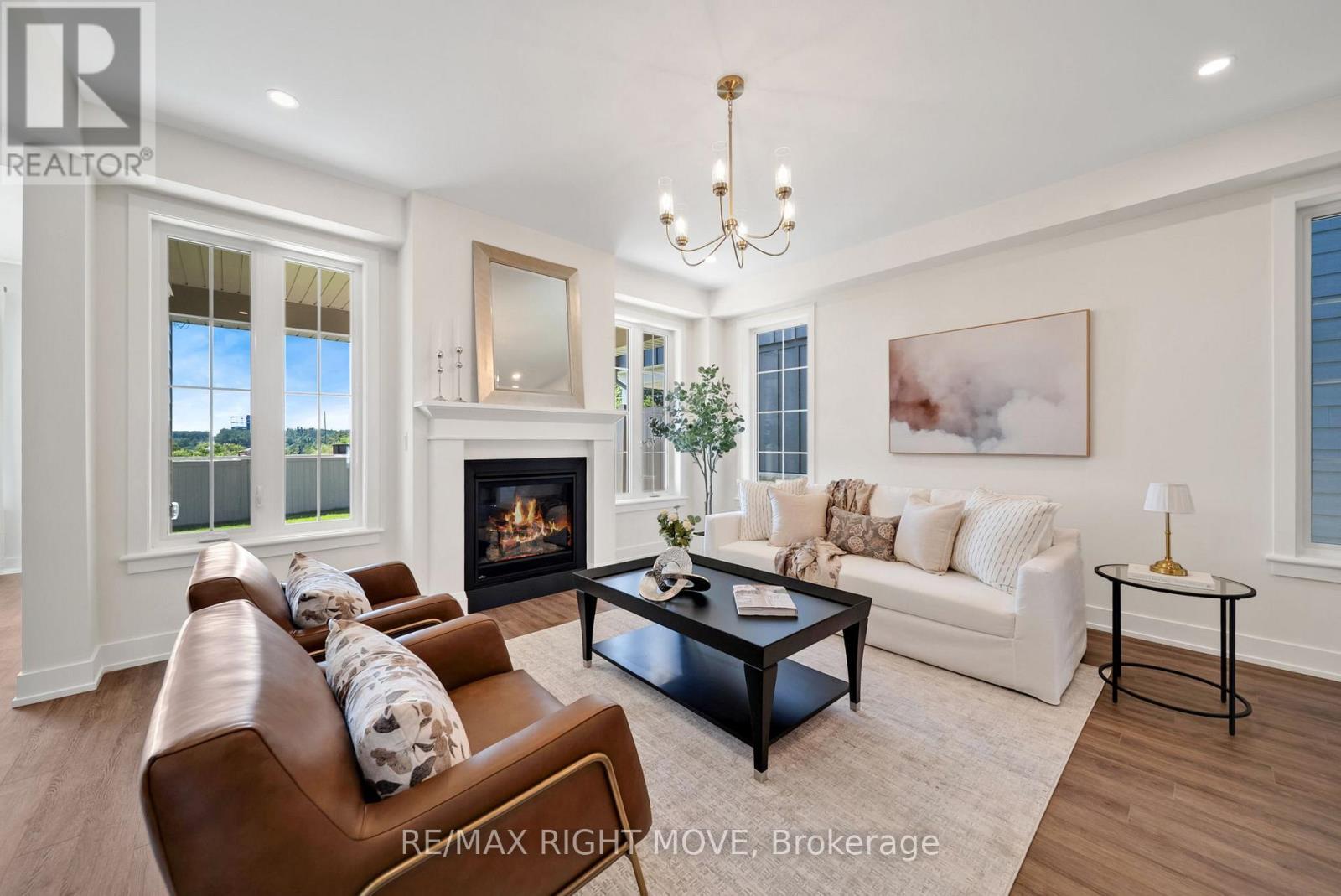 3194 Orion Boulevard, Orillia, ON - Indoor Photo Showing Living Room With Fireplace