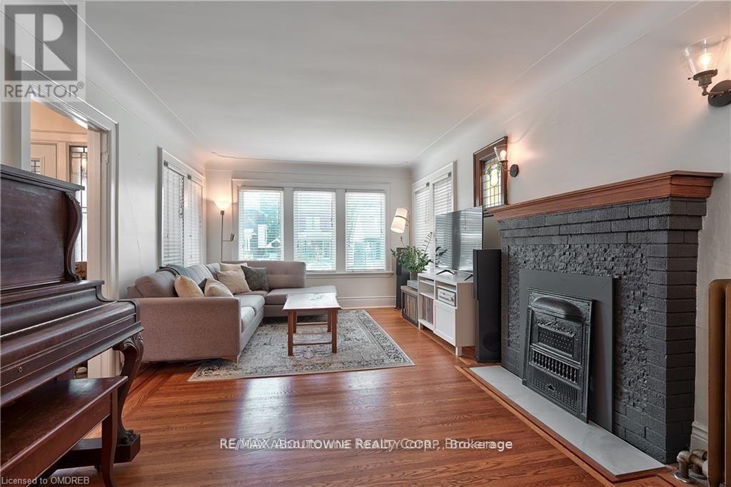 23 Ottawa Street S, Hamilton, ON - Indoor Photo Showing Living Room With Fireplace
