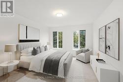 This primary suite has been virtually staged -