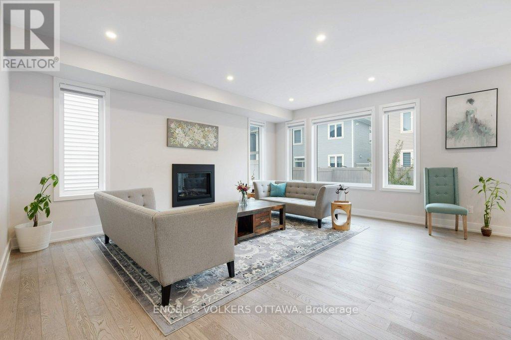 1010 Carden Lane, Ottawa, ON - Indoor Photo Showing Living Room With Fireplace