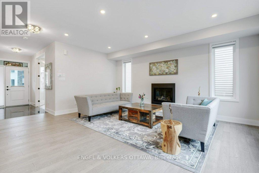 1010 Carden Lane, Ottawa, ON - Indoor Photo Showing Living Room With Fireplace