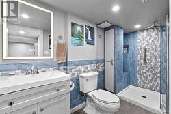 Beautiful tiled shower in basement. -