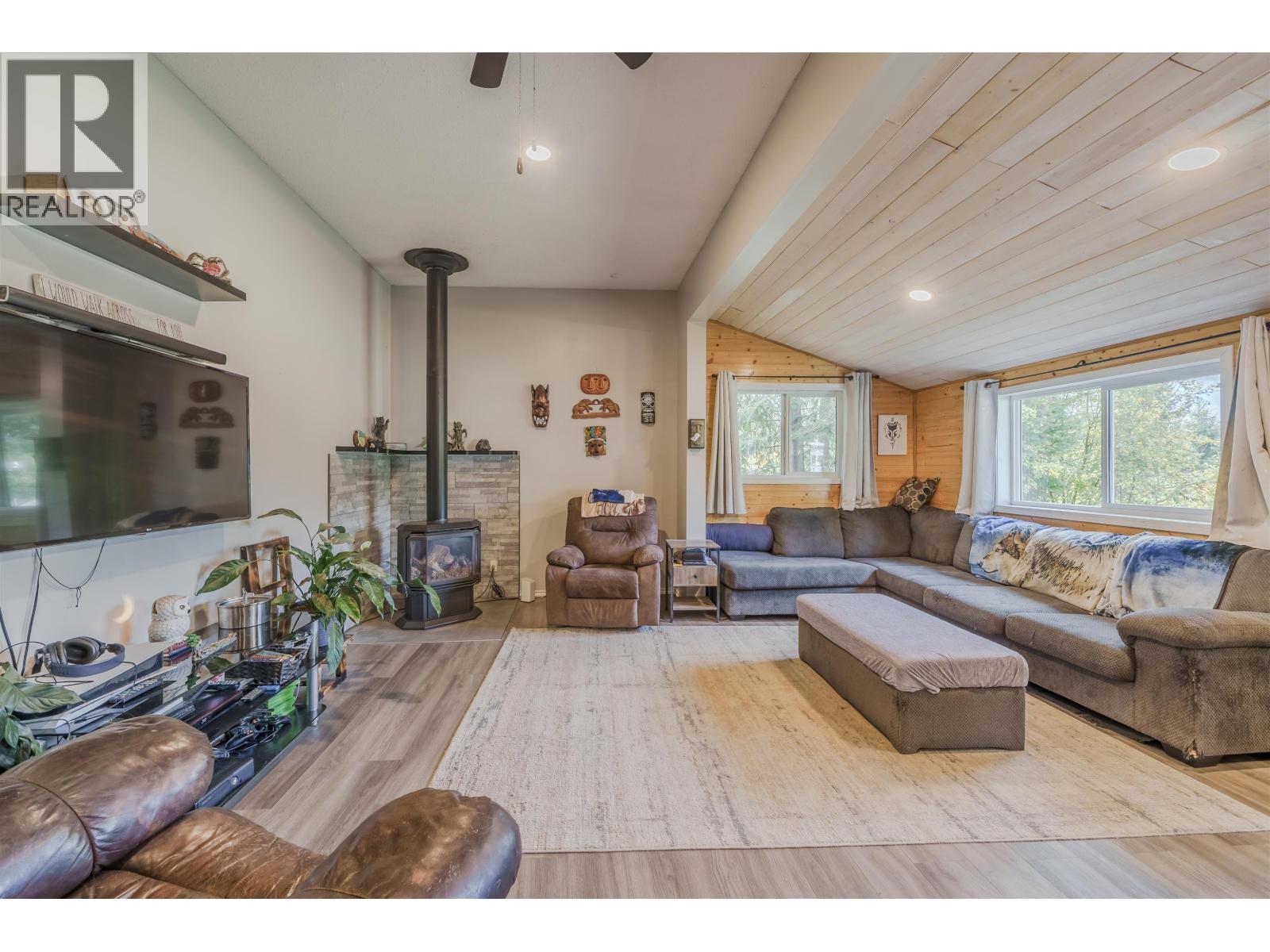 6395 Young Road, Horse Lake, BC - Indoor Photo Showing Living Room With Fireplace