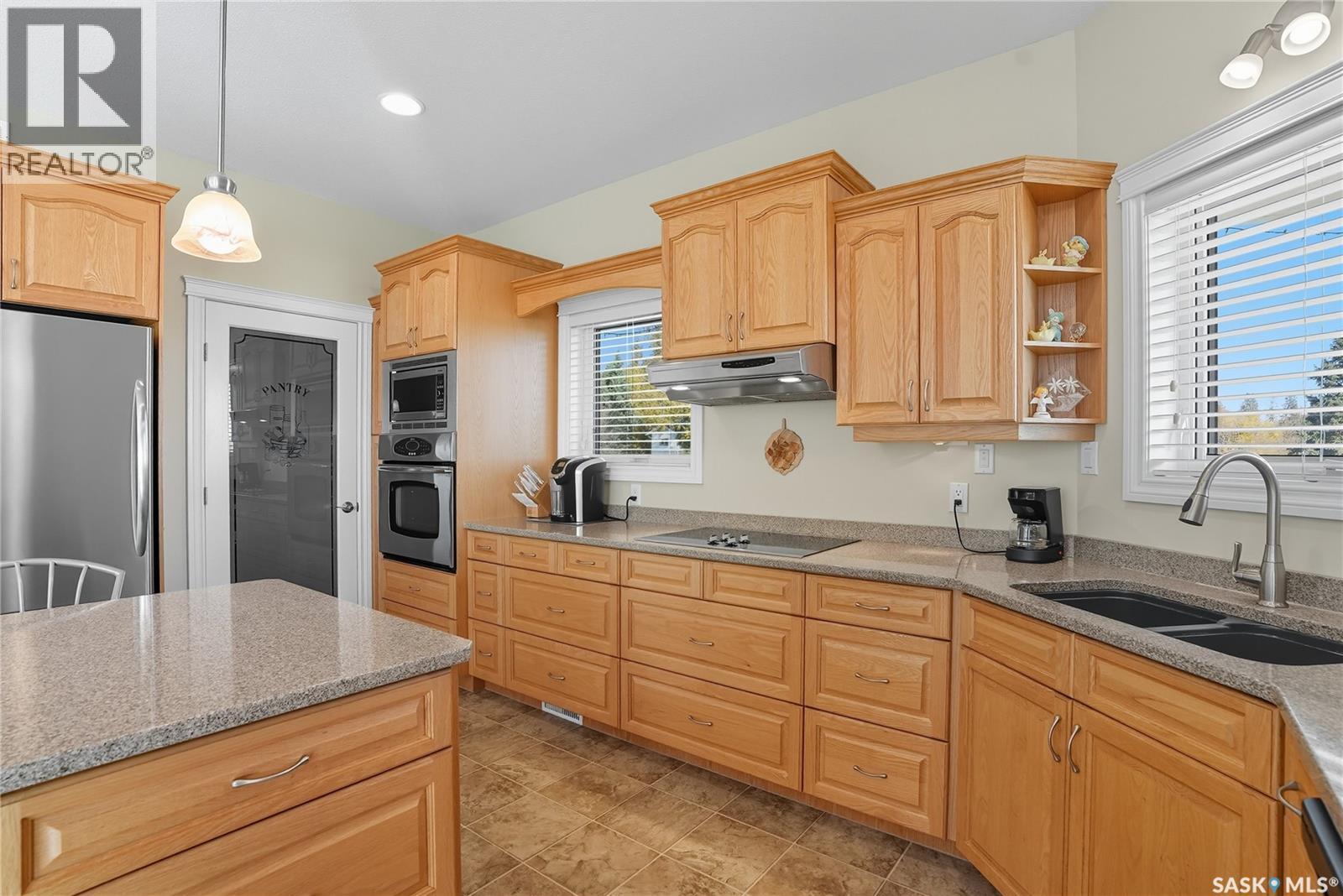 119 Aspen Crescent, Paddockwood Rm No. 520, SK - Indoor Photo Showing Kitchen With Double Sink