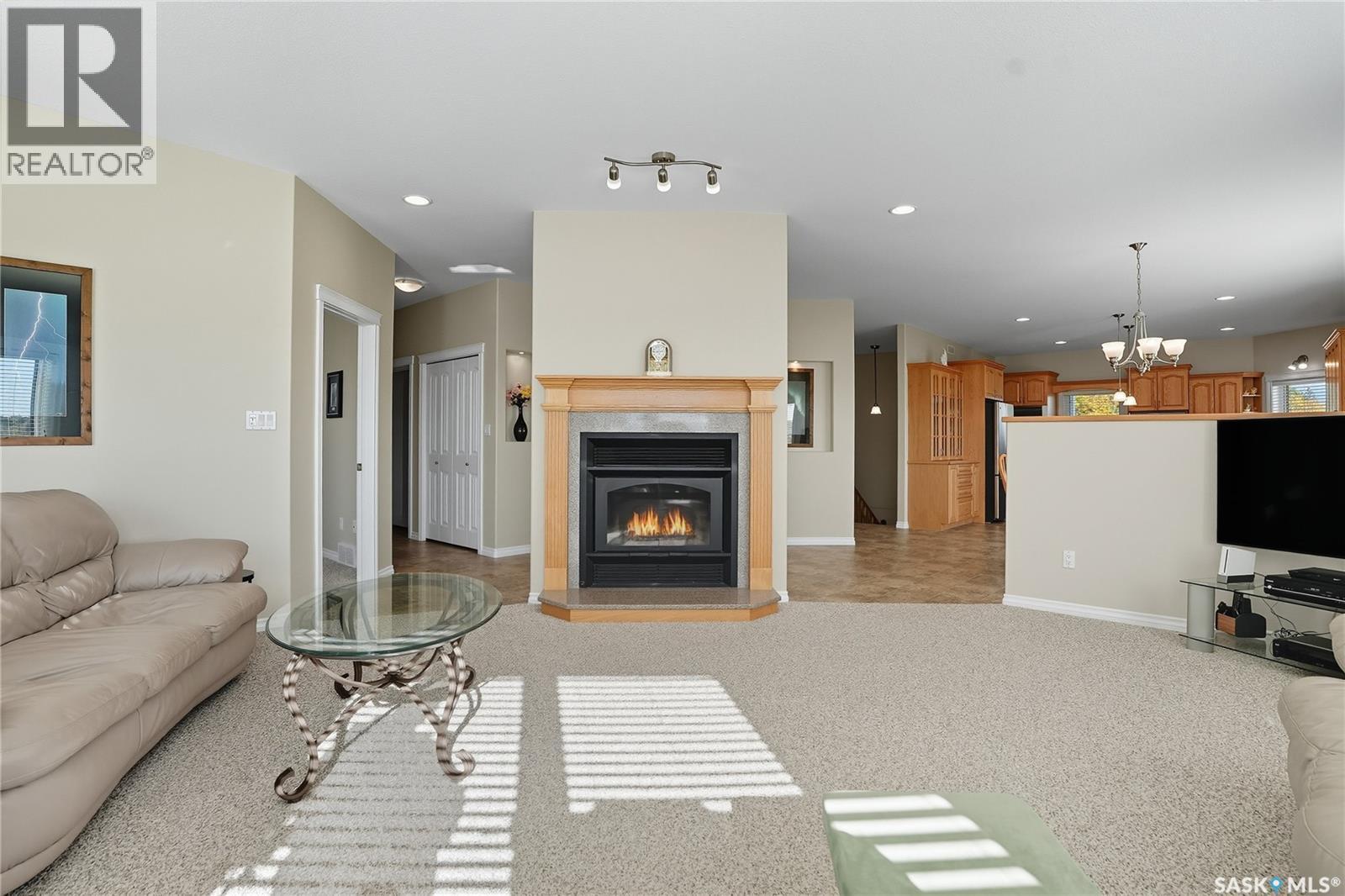 119 Aspen Crescent, Paddockwood Rm No. 520, SK - Indoor Photo Showing Living Room With Fireplace
