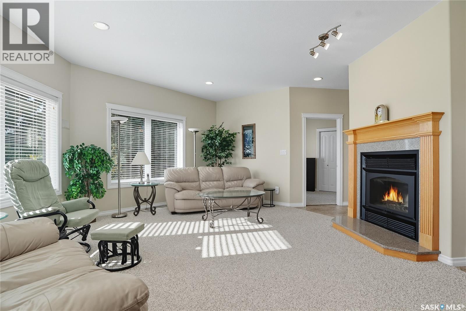 119 Aspen Crescent, Paddockwood Rm No. 520, SK - Indoor Photo Showing Living Room With Fireplace