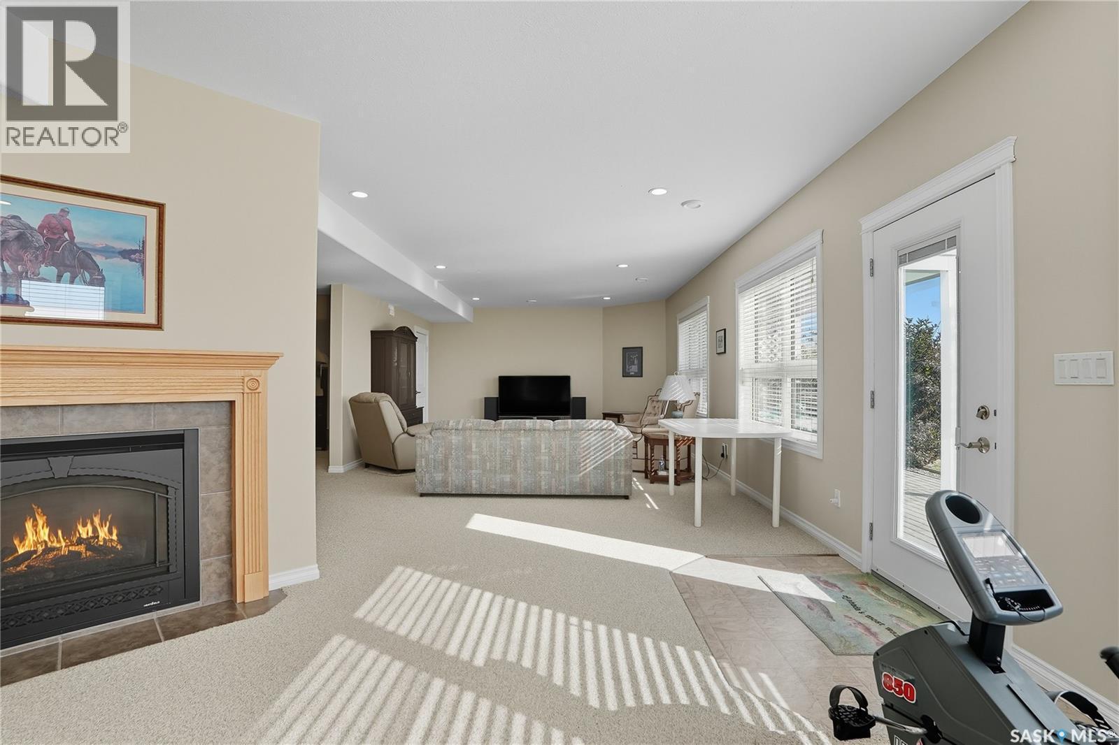 119 Aspen Crescent, Paddockwood Rm No. 520, SK - Indoor Photo Showing Living Room With Fireplace