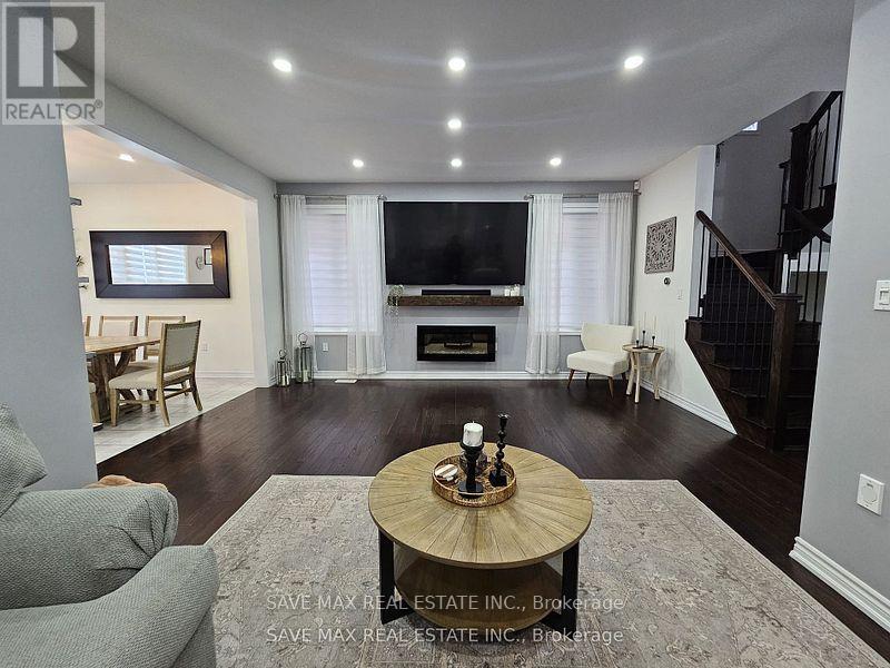Upper - 105 Whitlock Avenue E, Milton, ON - Indoor Photo Showing Living Room With Fireplace