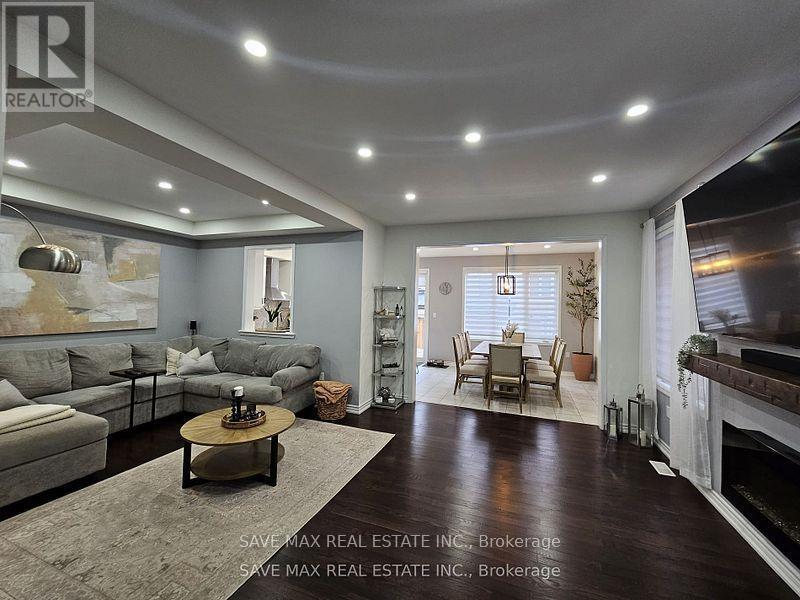 Upper - 105 Whitlock Avenue E, Milton, ON - Indoor Photo Showing Living Room With Fireplace