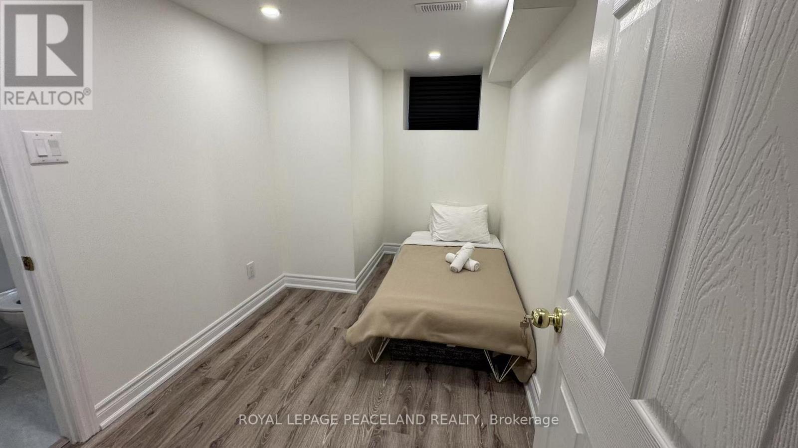 Lower - 60 Paperbirch Drive, Toronto, ON - Indoor Photo Showing Other Room