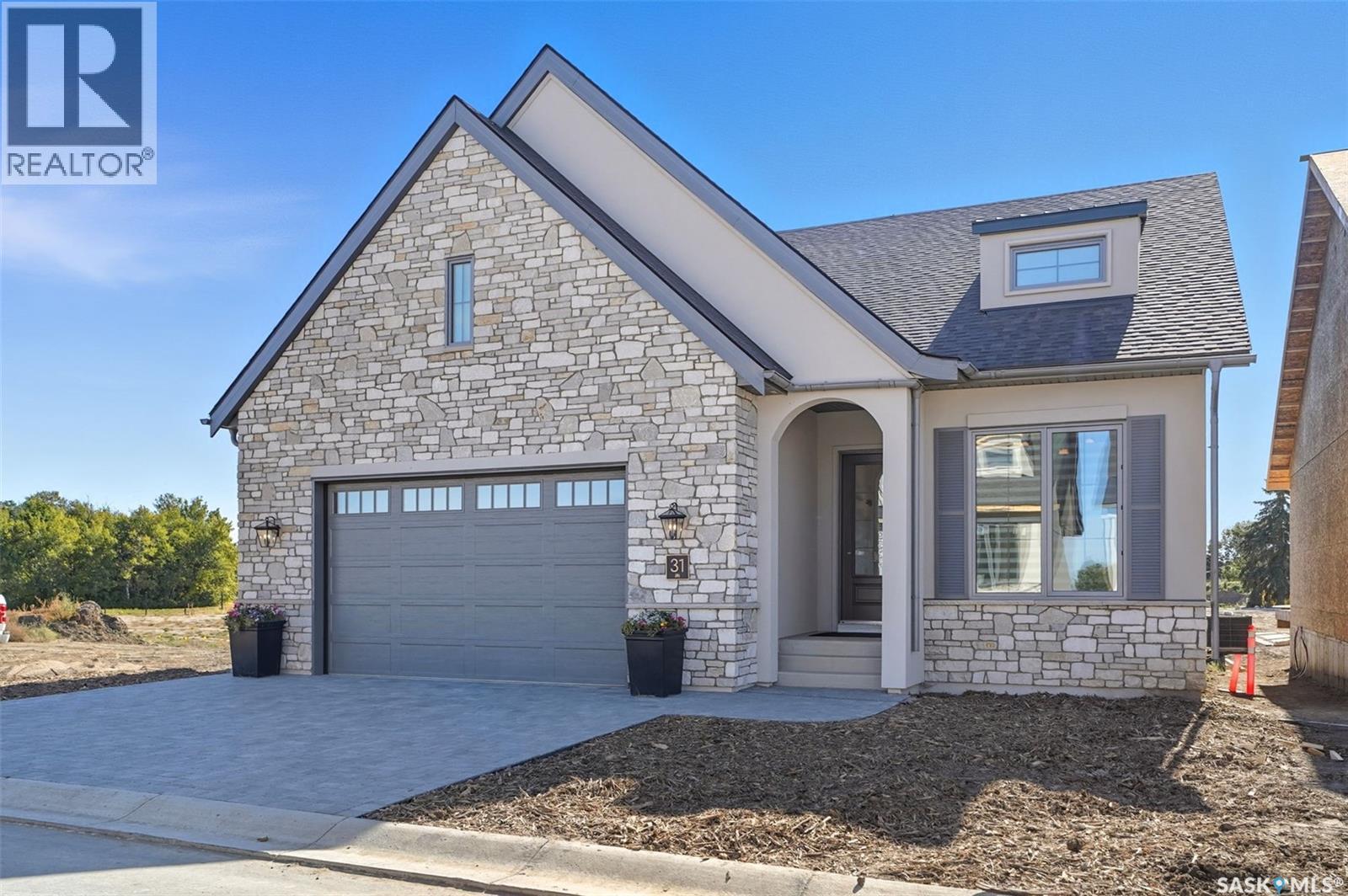 32 350 Cartwright Street, Saskatoon, SK - Outdoor With Facade