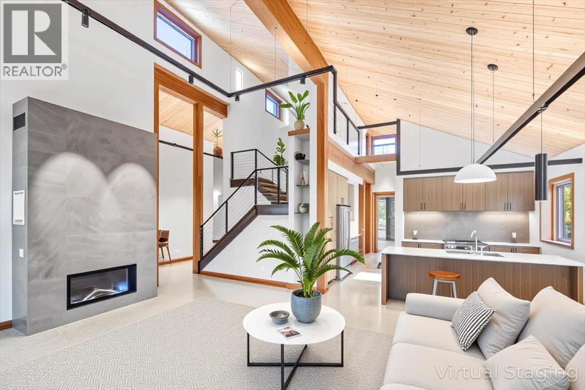 5538 Currie Bowl Way, Fernie, BC - Indoor Photo Showing Living Room With Fireplace