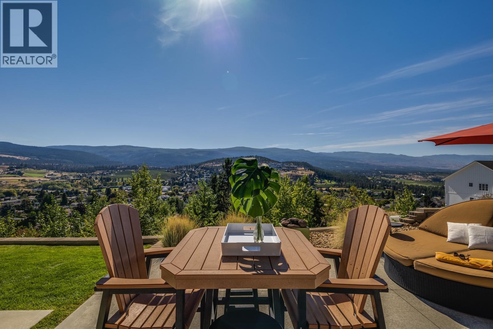 Take in the sights from many angles of this home - 1040 Henderson Drive, Kelowna, BC - Outdoor With Deck Patio Veranda With View