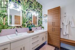 Double sink vanity with lots of cabinets -