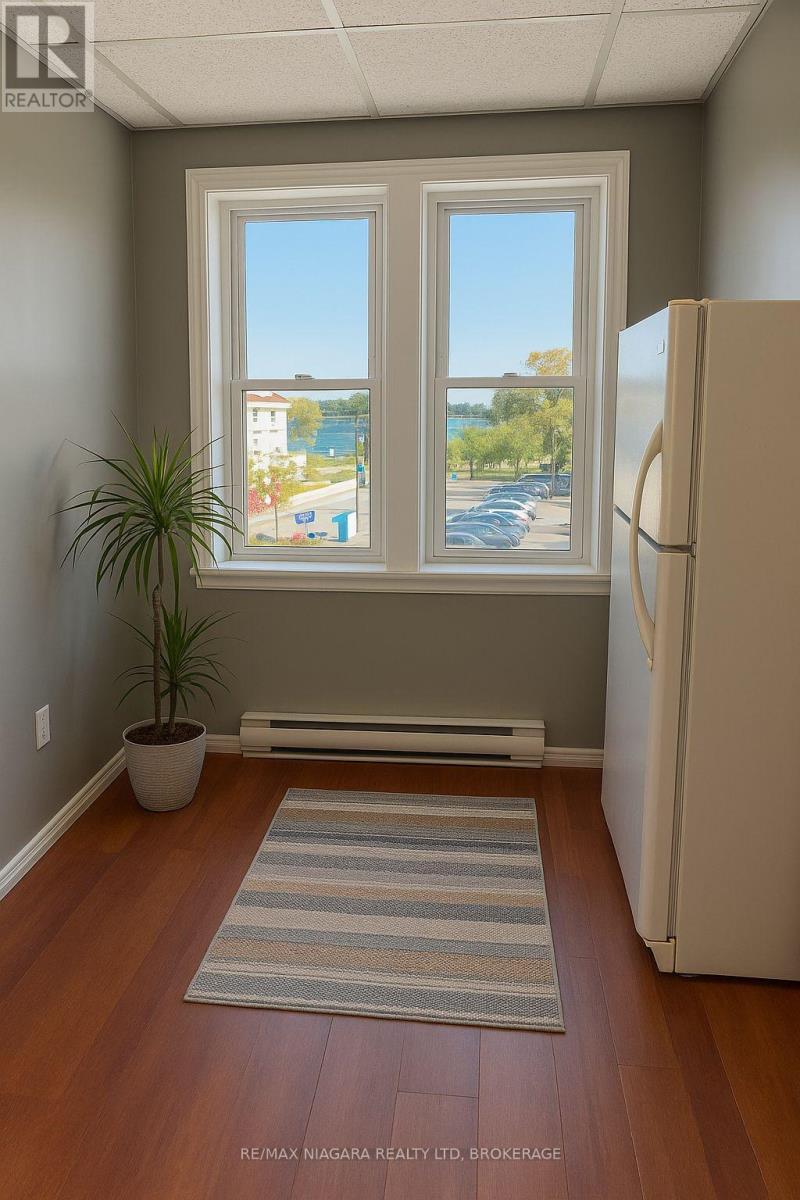 Kitchen - View of Niagara River - digitally staged - 2 - 23 Jarvis Street, Fort Erie (Central), ON