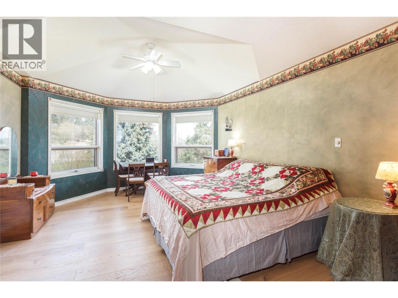 Primary Bedroom - 6655 Cosens Bay Road, Coldstream, BC - Indoor Photo Showing Bedroom