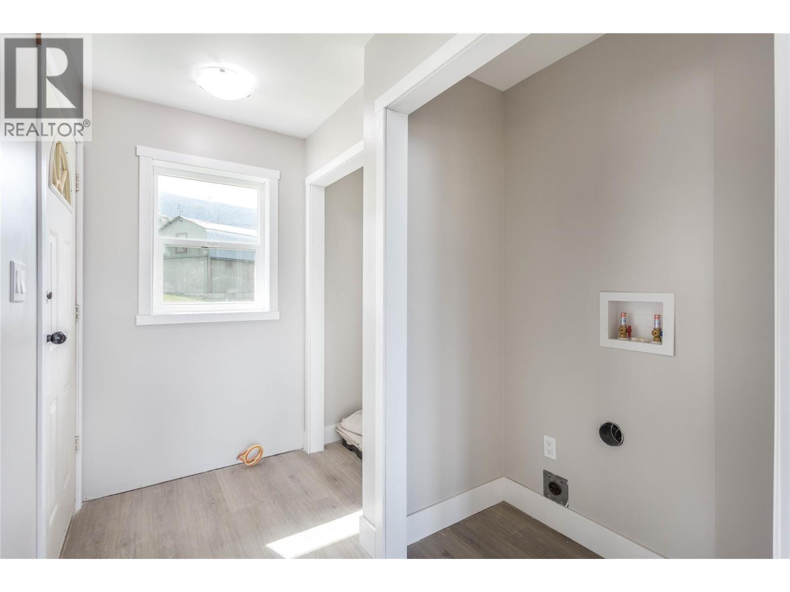 Loft Entry/Laundry Area - 6655 Cosens Bay Road, Coldstream, BC - Indoor Photo Showing Other Room
