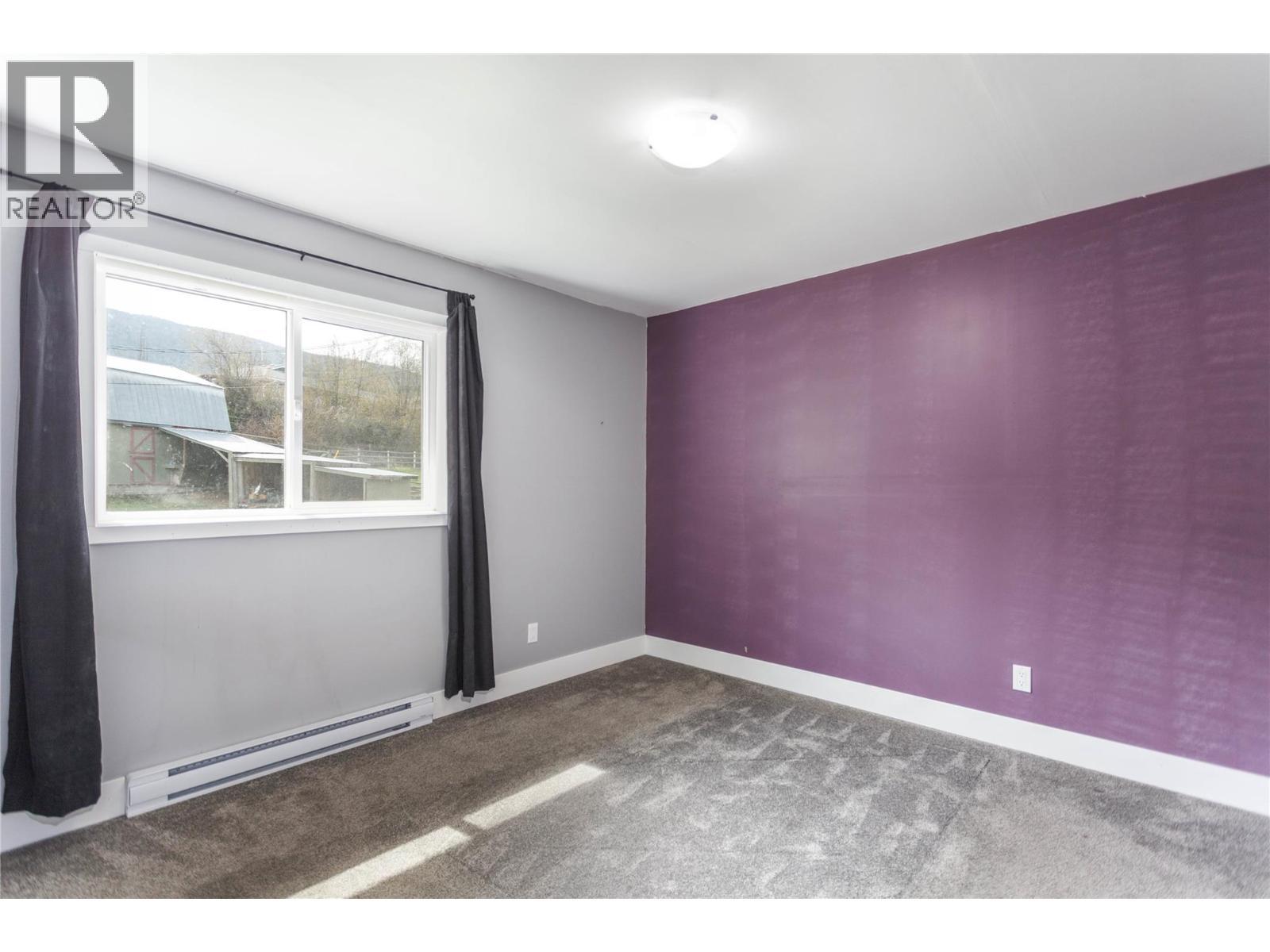 Loft Bedroom 1 - 6655 Cosens Bay Road, Coldstream, BC - Indoor Photo Showing Other Room