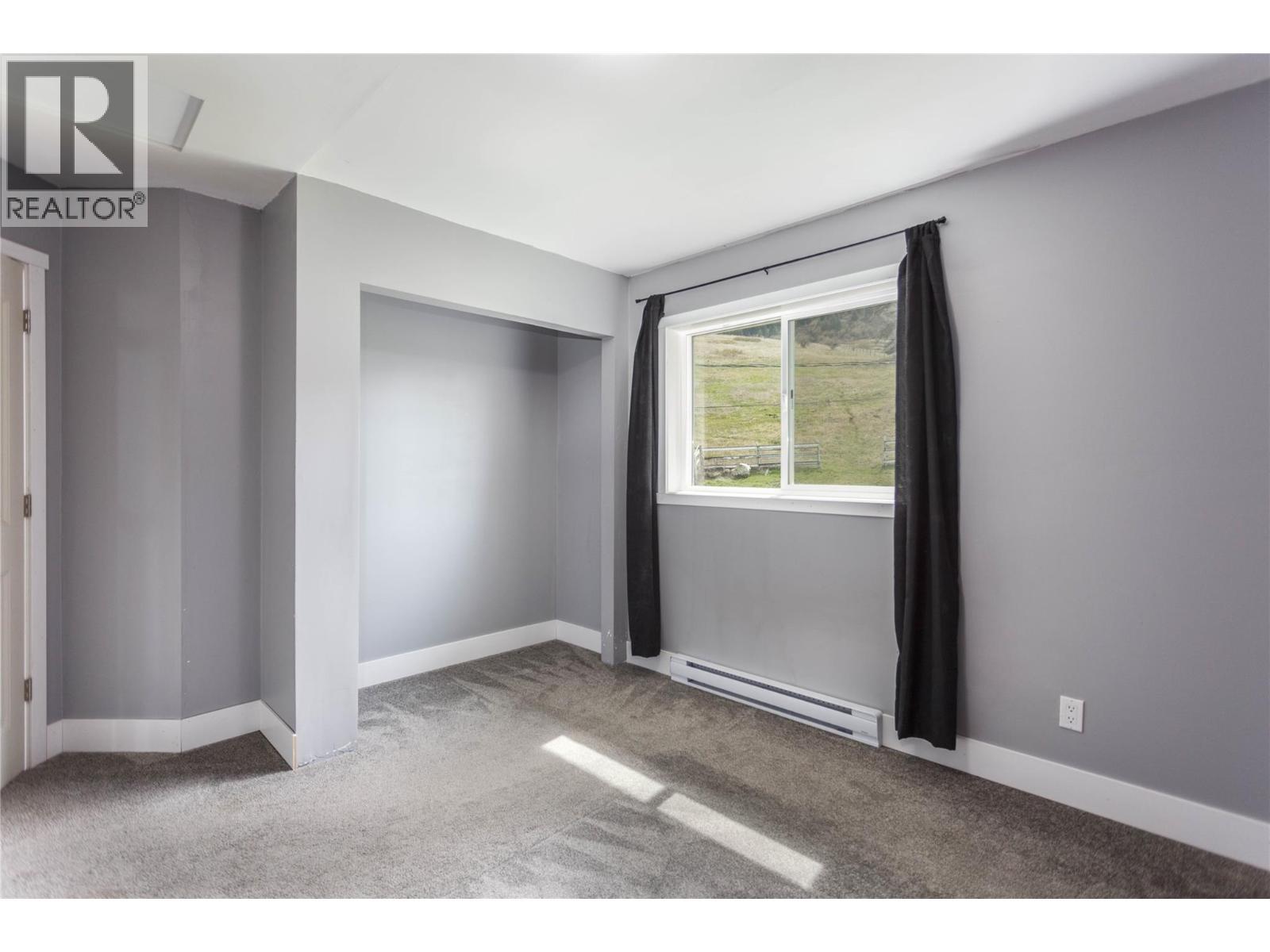 Loft Bedroom 1 - 6655 Cosens Bay Road, Coldstream, BC - Indoor Photo Showing Other Room
