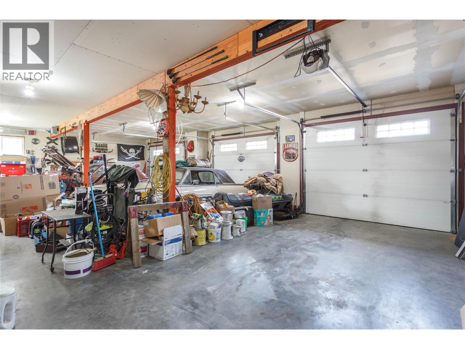 3rd Garage Area - 6655 Cosens Bay Road, Coldstream, BC - Indoor Photo Showing Garage