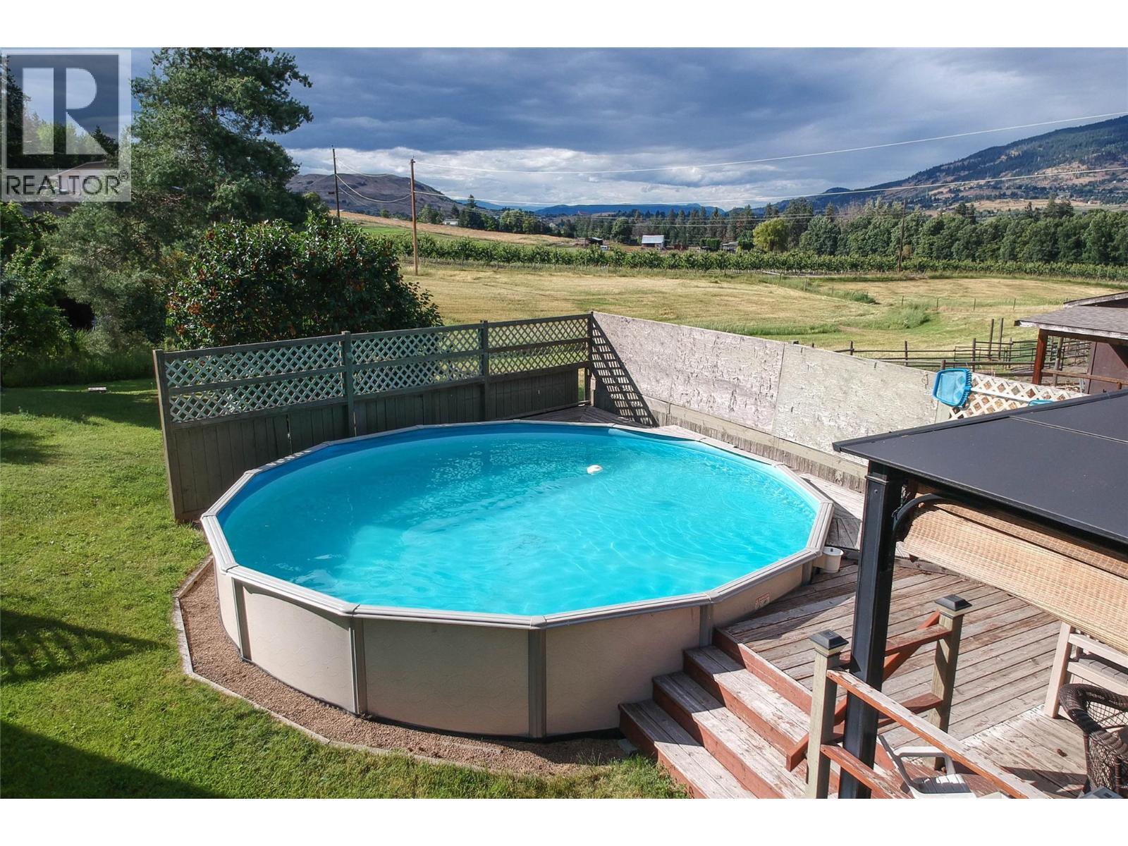 6655 Cosens Bay Road, Coldstream, BC - Outdoor With Above Ground Pool