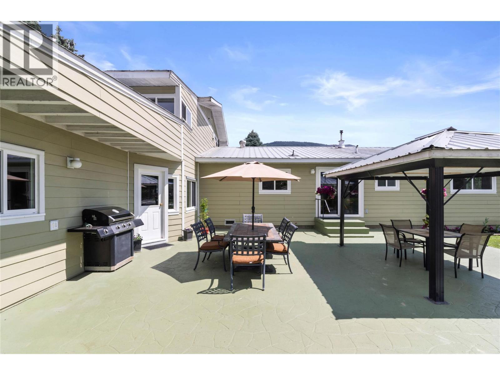 7088 97A Highway, Grindrod, BC - Outdoor With Deck Patio Veranda