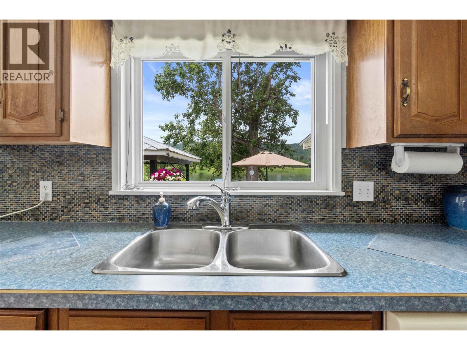 7088 97A Highway, Grindrod, BC - Indoor Photo Showing Kitchen With Double Sink