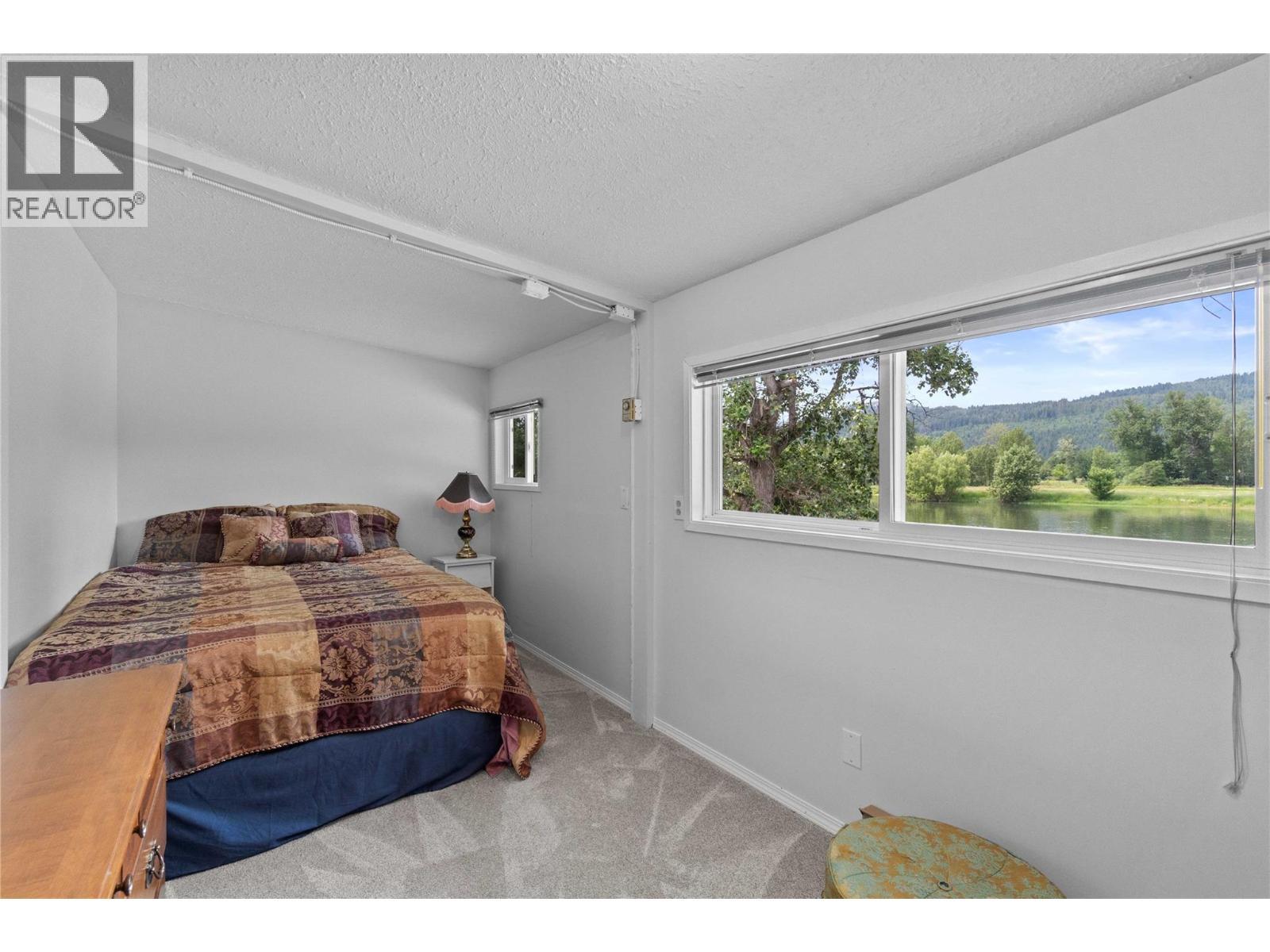 7088 97A Highway, Grindrod, BC - Indoor Photo Showing Bedroom