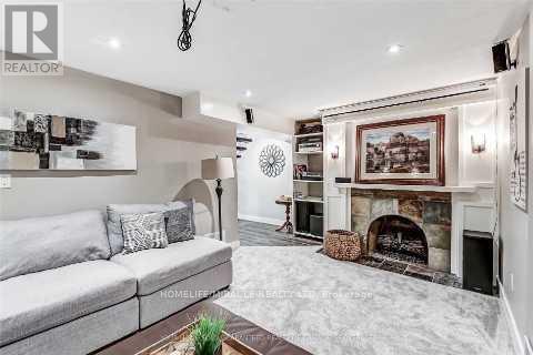 37 - 6855 Glen Erin Drive, Mississauga, ON - Indoor Photo Showing Living Room With Fireplace