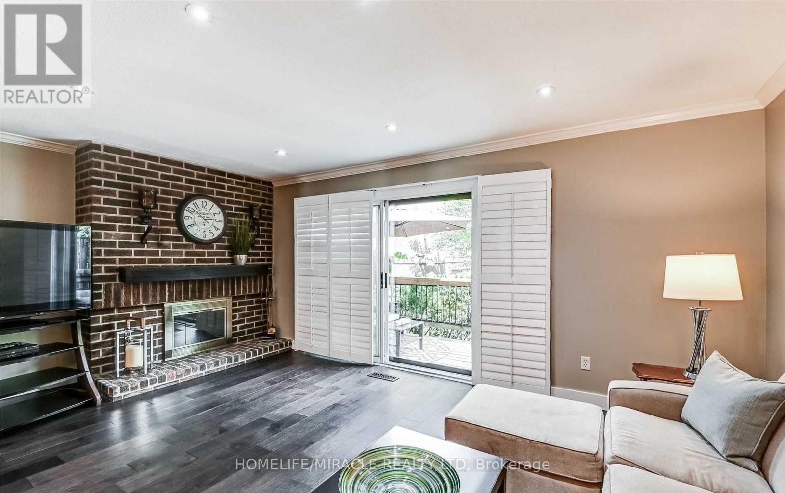 37 - 6855 Glen Erin Drive, Mississauga, ON - Indoor Photo Showing Living Room With Fireplace
