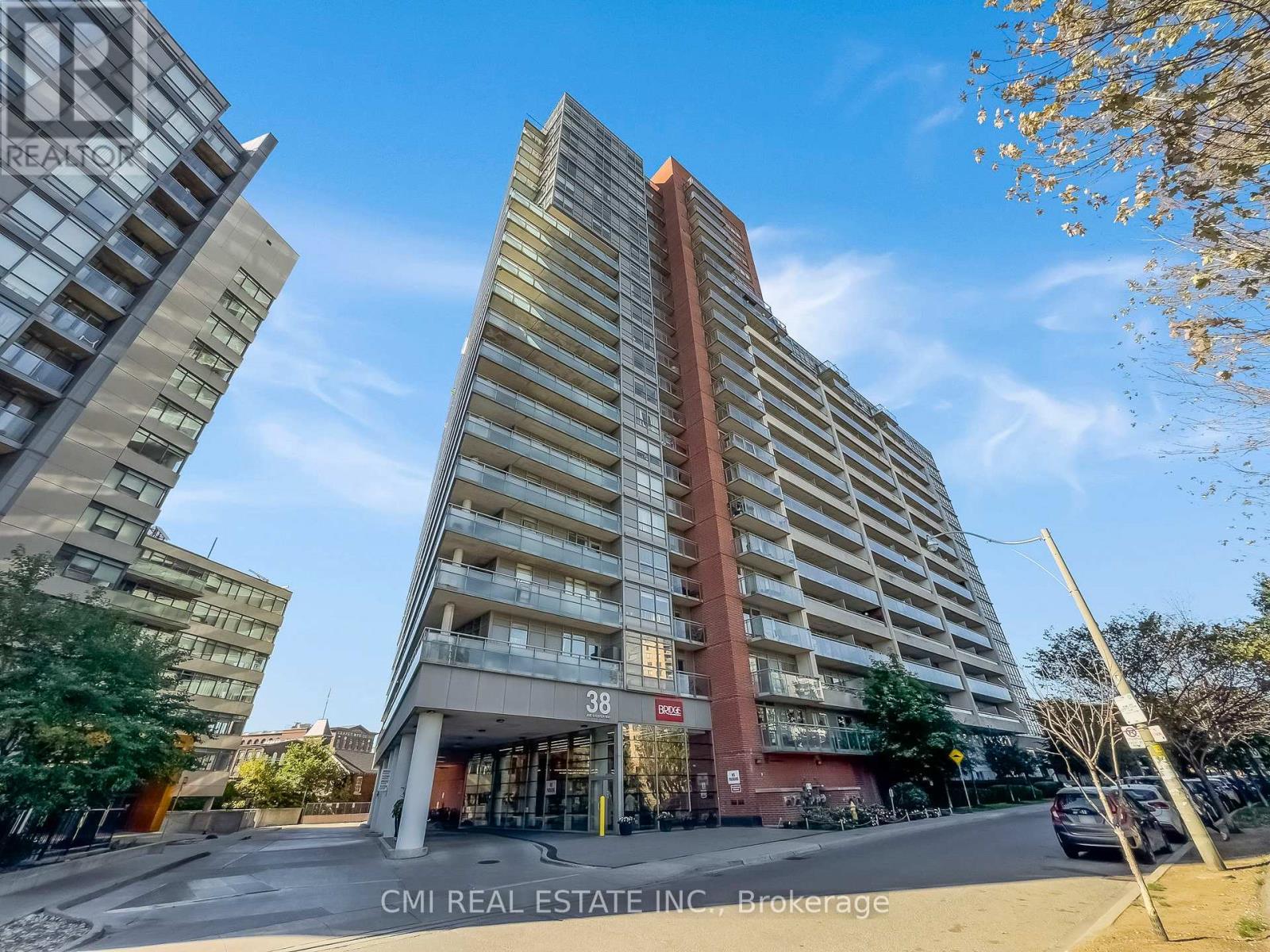 725 - 38 Joe Shuster Way, Toronto, ON - Outdoor With Balcony With Facade